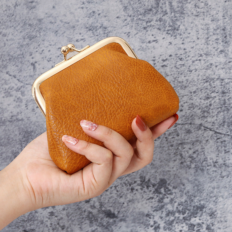 Lady nude leather coin bag (must take 200)
