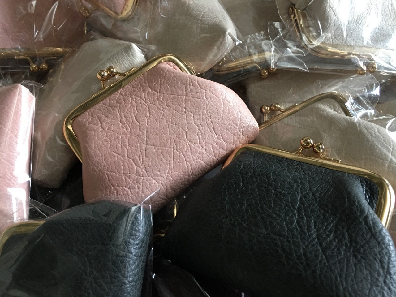 Lady nude leather coin bag (must take 200)