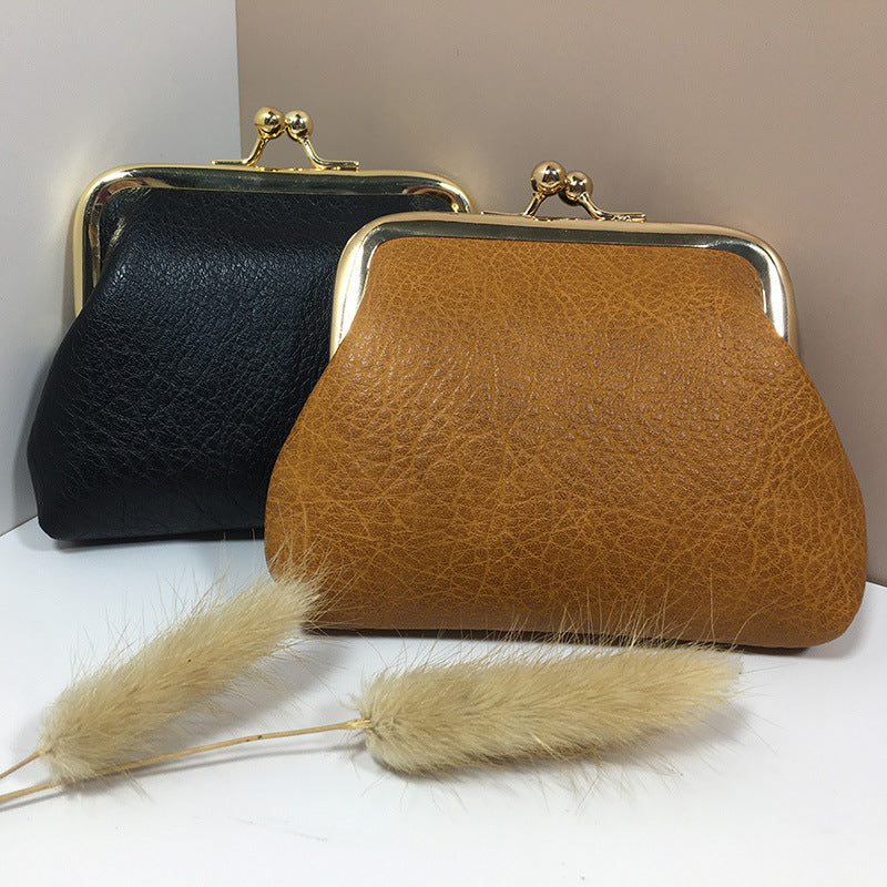 Lady nude leather coin bag (must take 200)