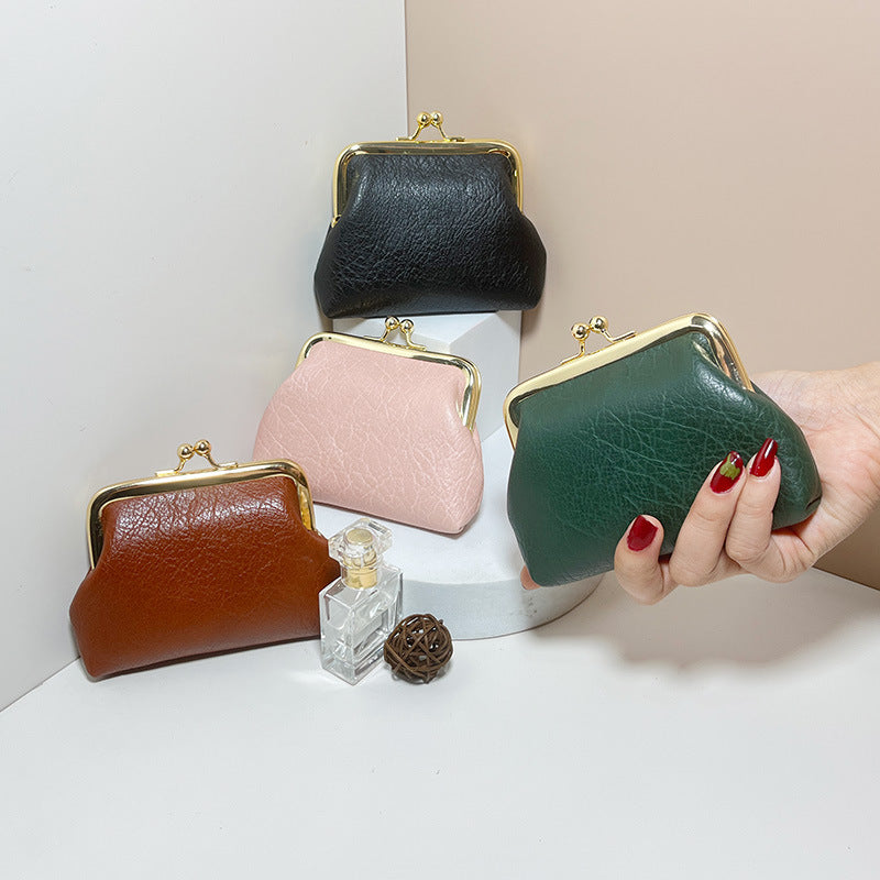 Lady nude leather coin bag (must take 200)