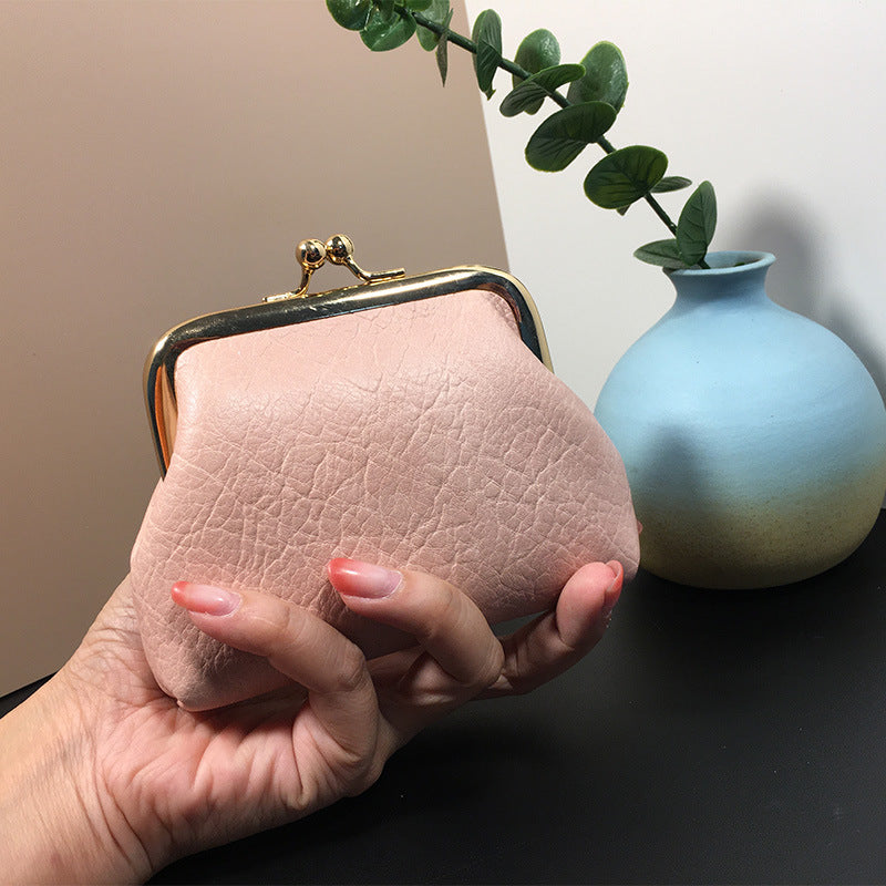 Lady nude leather coin bag (must take 200)