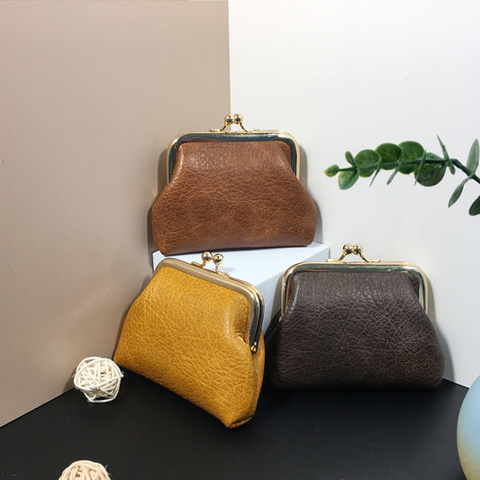 Lady nude leather coin bag (must take 200)